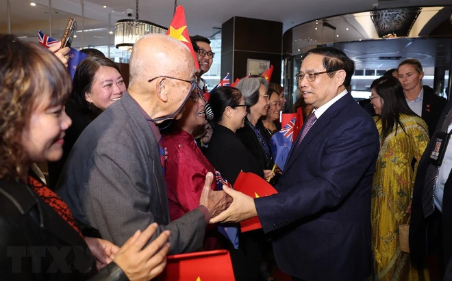 Thủ tướng Phạm Minh Chính và Phu nhân với cộng đồng người Việt Nam tại New Zealand. (Ảnh: Dương Giang/TTXVN) TTXVN_1003Thutuong2.jpg